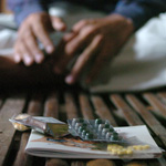 HIV positive man and antiretroviral medicines,
                                    Cambodia